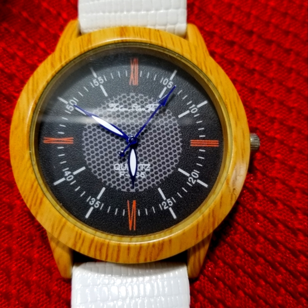 Bobo Bird bamboo wooden watch with white leather band.